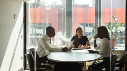 Team discussing around the table